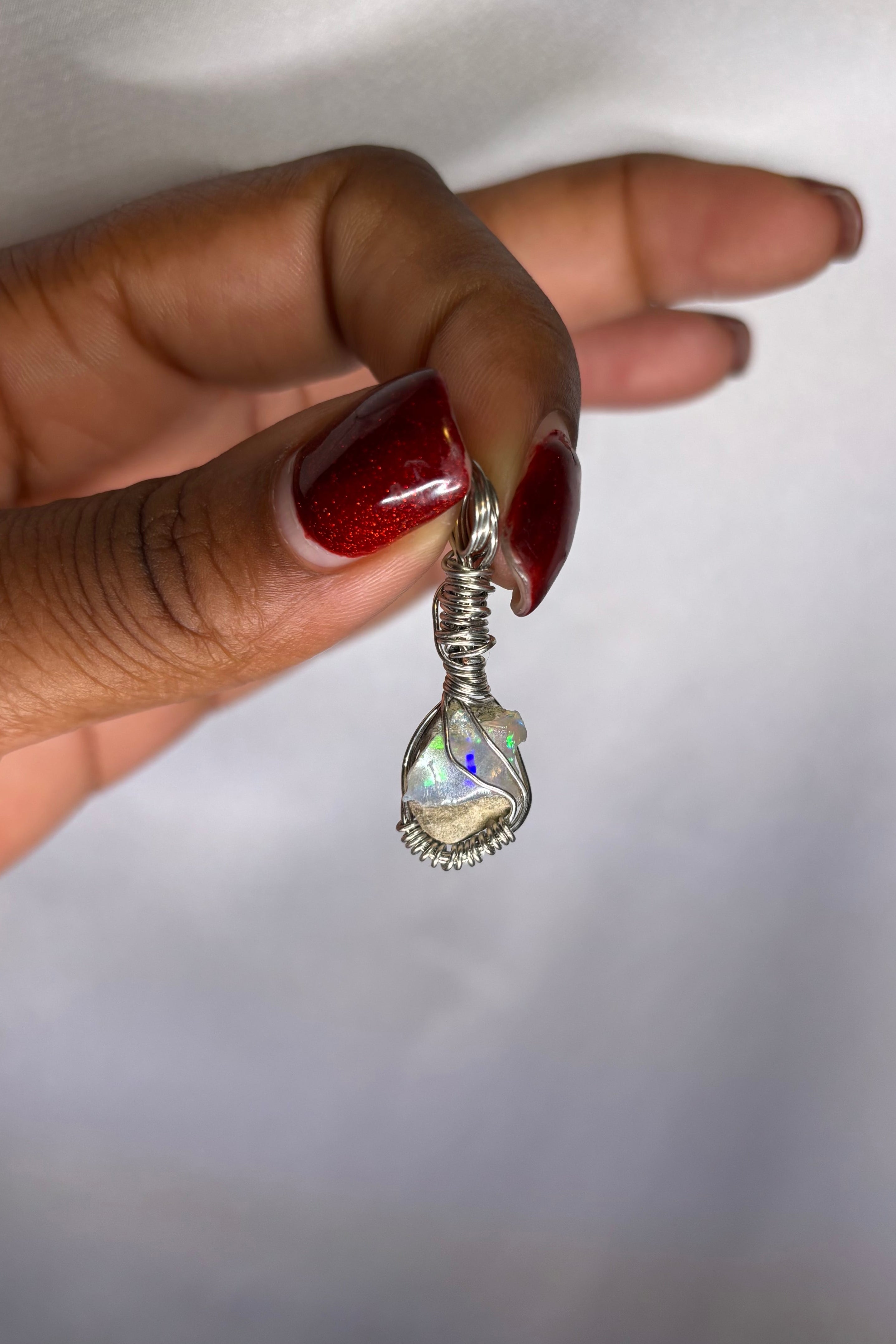 Copper-wrapped Ethiopian Opal Pendant - (1)