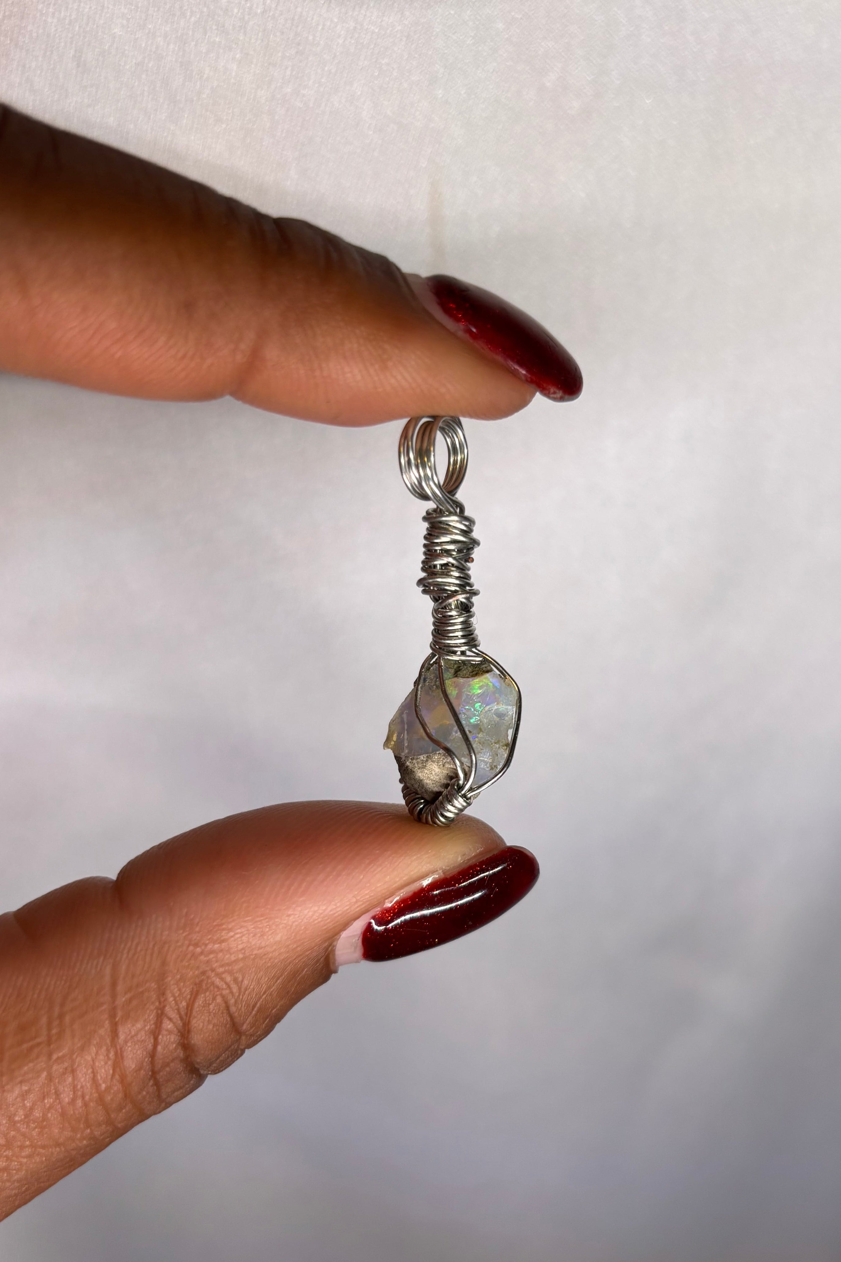 Copper-wrapped Ethiopian Opal Pendant - (1)