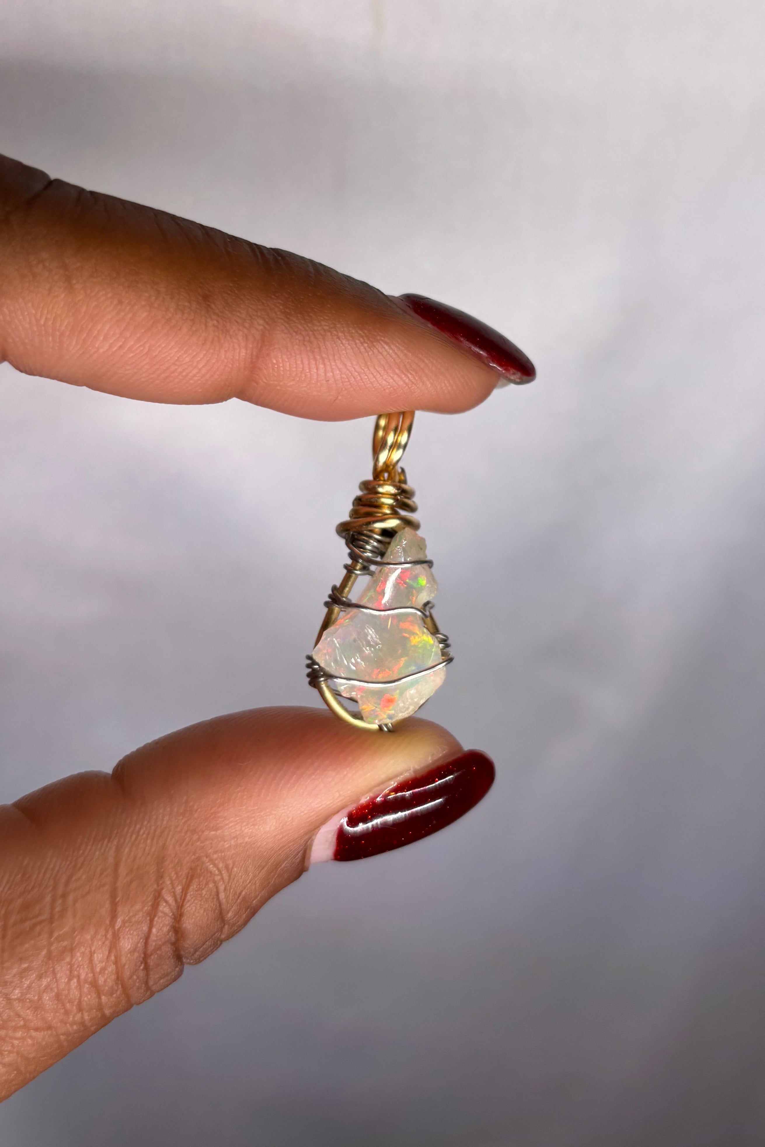 Copper-wrapped Ethiopian Opal Pendant - (2)