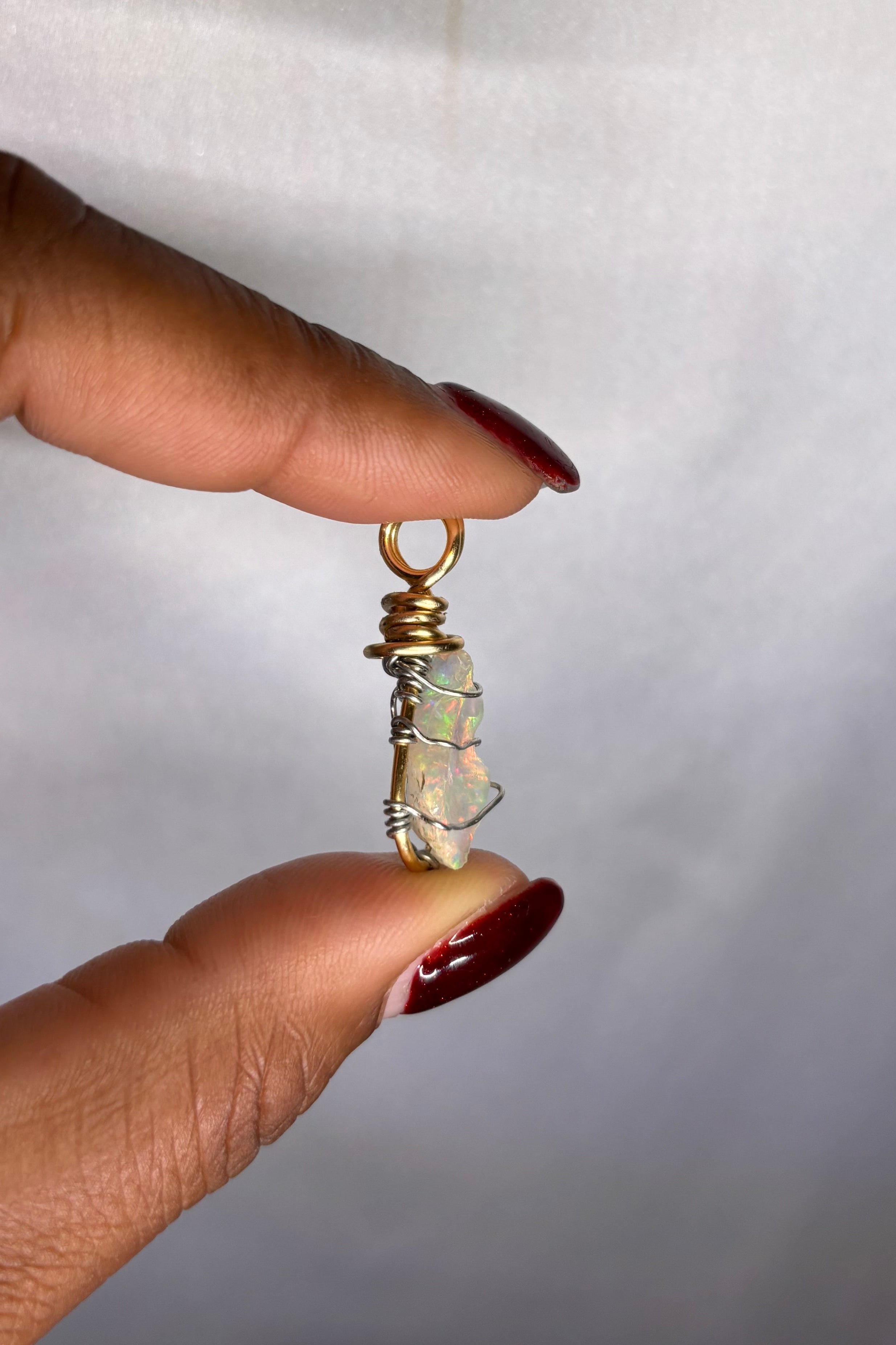 Copper-wrapped Ethiopian Opal Pendant - (2)