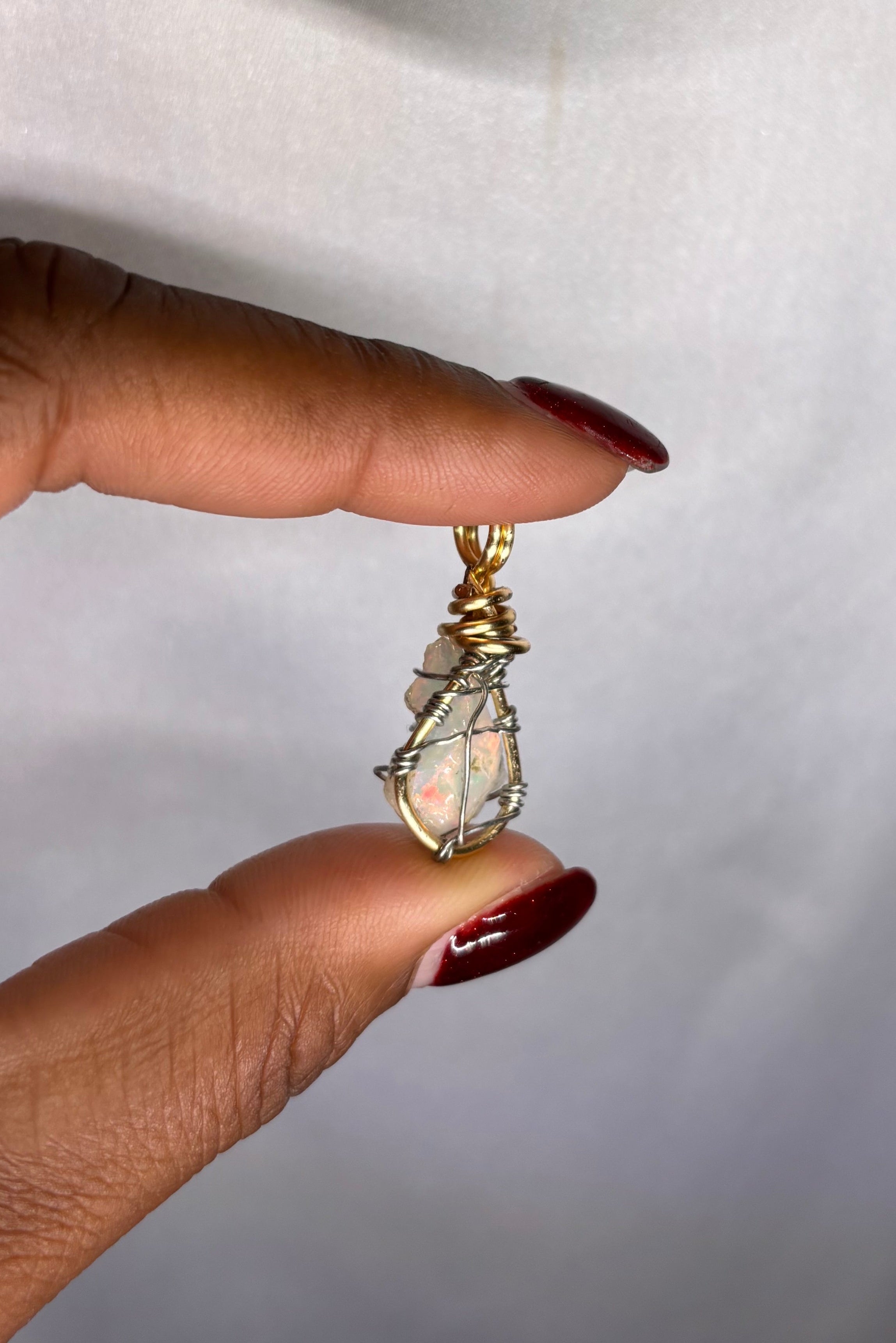 Copper-wrapped Ethiopian Opal Pendant - (2)