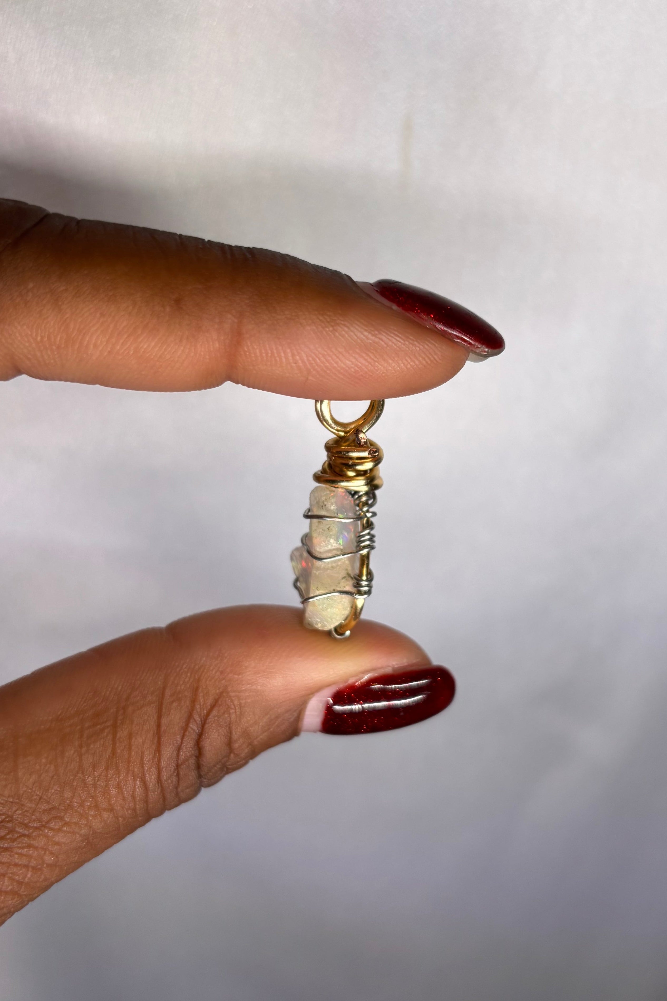 Copper-wrapped Ethiopian Opal Pendant - (2)
